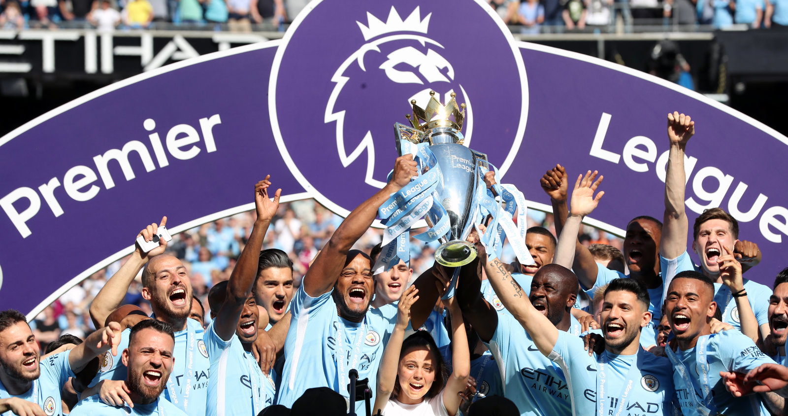 File photo dated 06-05-2018 of Manchester City's Vincent Kompany (centre left), Yaya Toure (centre right) and Sergio Aguero (second right) lift the Premier League trophy.